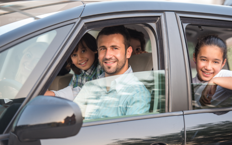 Dad in car with kids