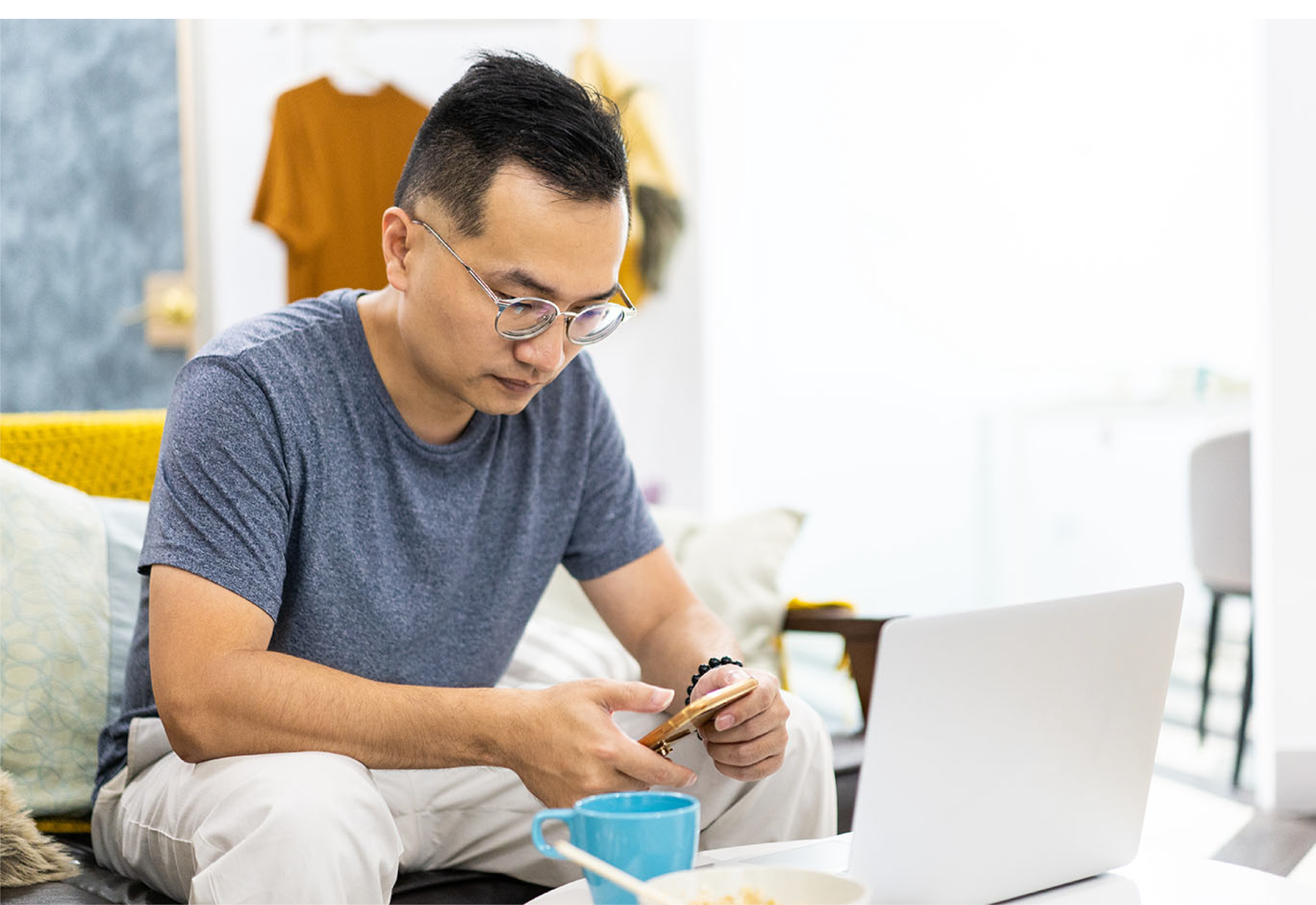 Man looking at his cell phone.